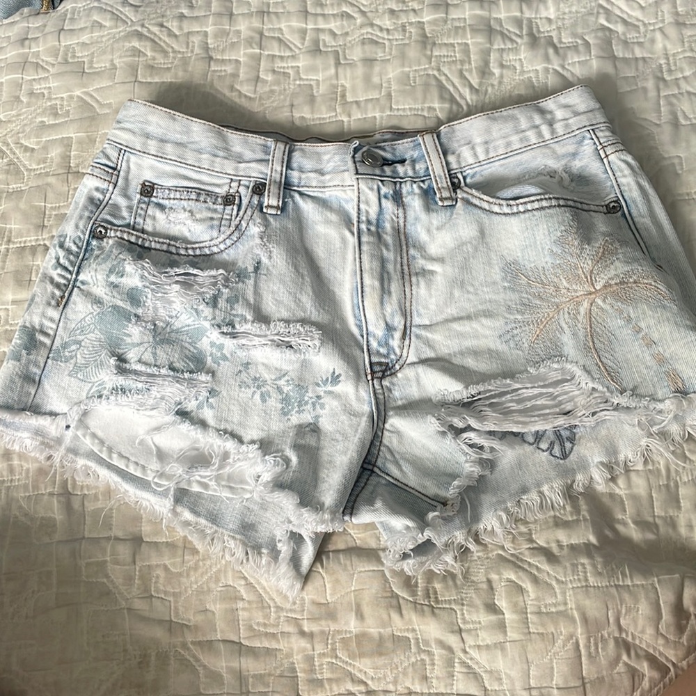 American Eagle shorts with tropical patterns.